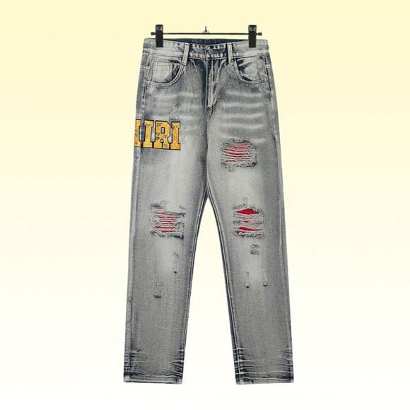 Amiri Jeans With Yellow Embroidered Letters